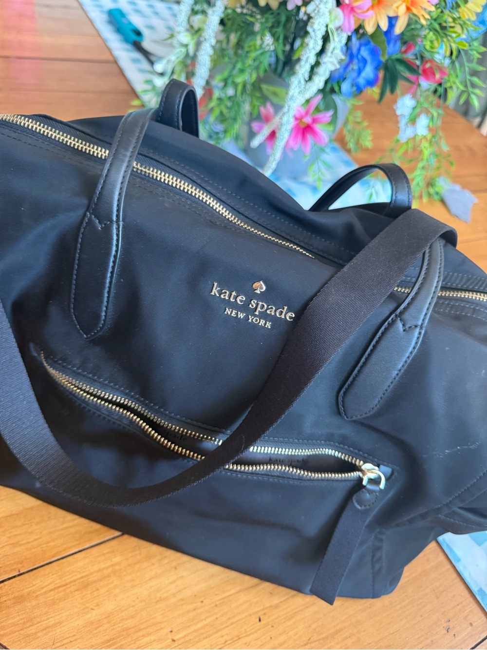 kate spade black interior tote with gold logo plaque